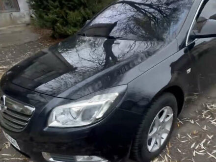 Чорний Опель Інсігнія, об'ємом двигуна 1.36 л та пробігом 229 тис. км за 6750 $, фото 1 на Automoto.ua