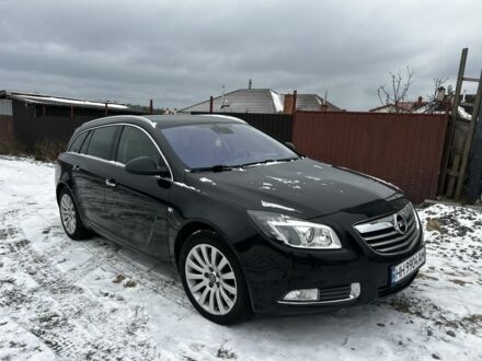 Чорний Опель Інсігнія, об'ємом двигуна 2 л та пробігом 320 тис. км за 7999 $, фото 1 на Automoto.ua