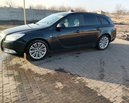 Чорний Опель Інсігнія, об'ємом двигуна 2 л та пробігом 239 тис. км за 4899 $, фото 1 на Automoto.ua