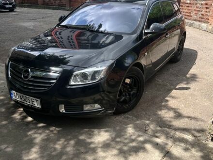 Чорний Опель Інсігнія, об'ємом двигуна 2 л та пробігом 280 тис. км за 7500 $, фото 1 на Automoto.ua