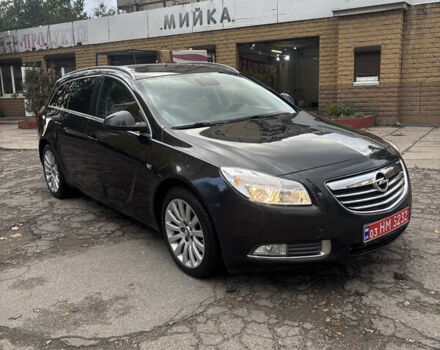 Черный Опель Инсигния, объемом двигателя 1.96 л и пробегом 333 тыс. км за 9950 $, фото 1 на Automoto.ua