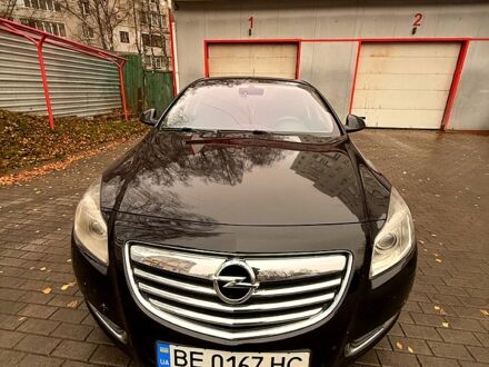 Черный Опель Инсигния, объемом двигателя 2 л и пробегом 209 тыс. км за 7500 $, фото 1 на Automoto.ua