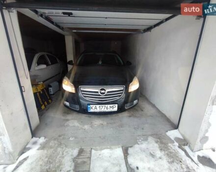 Чорний Опель Інсігнія, об'ємом двигуна 1.96 л та пробігом 222 тис. км за 7600 $, фото 1 на Automoto.ua