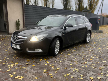 Чорний Опель Інсігнія, об'ємом двигуна 2 л та пробігом 251 тис. км за 9000 $, фото 1 на Automoto.ua
