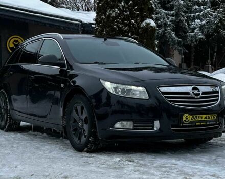Чорний Опель Інсігнія, об'ємом двигуна 2 л та пробігом 231 тис. км за 8999 $, фото 1 на Automoto.ua
