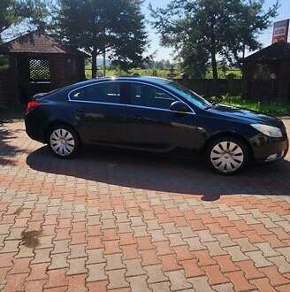 Черный Опель Инсигния, объемом двигателя 1.96 л и пробегом 270 тыс. км за 8950 $, фото 1 на Automoto.ua