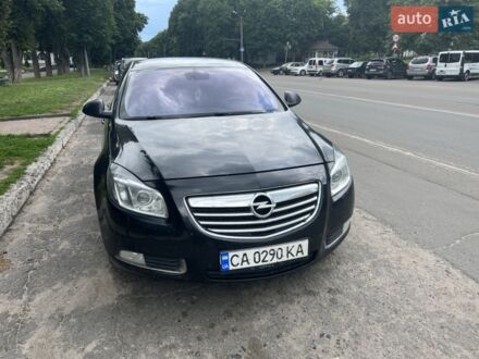 Чорний Опель Інсігнія, об'ємом двигуна 1.96 л та пробігом 295 тис. км за 8500 $, фото 1 на Automoto.ua