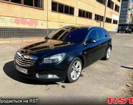 Чорний Опель Інсігнія, об'ємом двигуна 2 л та пробігом 29000 тис. км за 7250 $, фото 1 на Automoto.ua