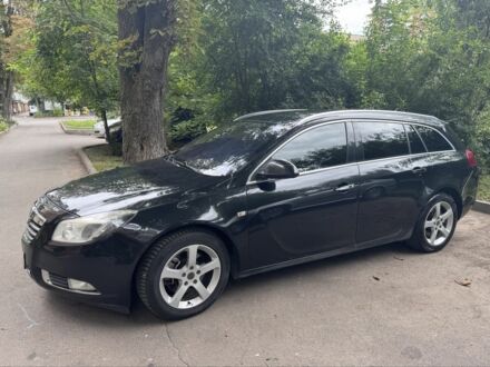 Чорний Опель Інсігнія, об'ємом двигуна 2 л та пробігом 220 тис. км за 7450 $, фото 1 на Automoto.ua