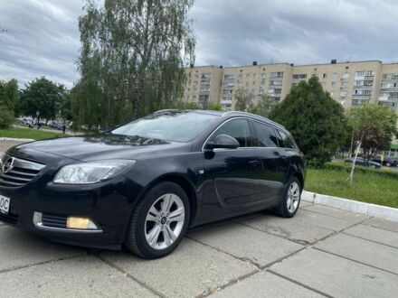 Черный Опель Инсигния, объемом двигателя 2 л и пробегом 303 тыс. км за 7700 $, фото 1 на Automoto.ua