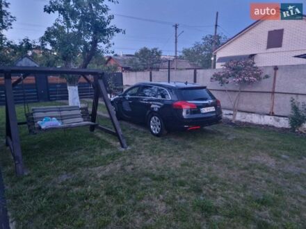 Чорний Опель Інсігнія, об'ємом двигуна 1.96 л та пробігом 300 тис. км за 9200 $, фото 1 на Automoto.ua