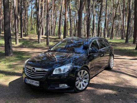 Чорний Опель Інсігнія, об'ємом двигуна 2 л та пробігом 190 тис. км за 9000 $, фото 1 на Automoto.ua