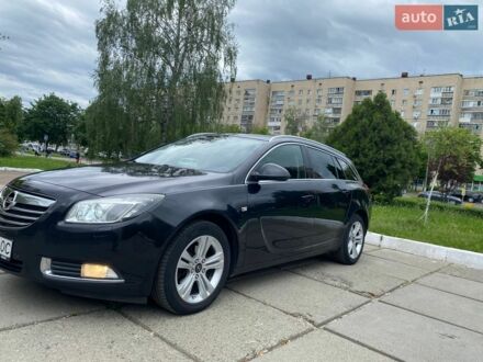 Чорний Опель Інсігнія, об'ємом двигуна 2 л та пробігом 303 тис. км за 7500 $, фото 1 на Automoto.ua