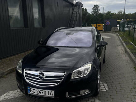 Черный Опель Инсигния, объемом двигателя 1.96 л и пробегом 300 тыс. км за 10400 $, фото 1 на Automoto.ua