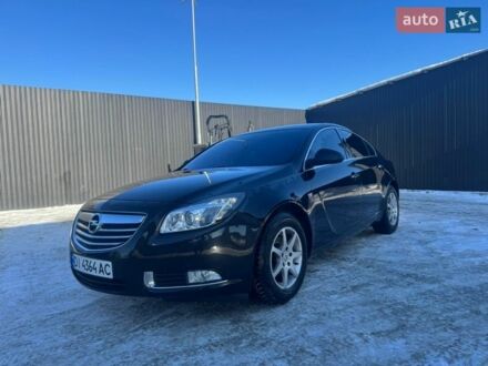 Черный Опель Инсигния, объемом двигателя 1.4 л и пробегом 230 тыс. км за 6450 $, фото 1 на Automoto.ua