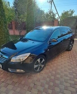 Чорний Опель Інсігнія, об'ємом двигуна 1.96 л та пробігом 275 тис. км за 7500 $, фото 1 на Automoto.ua