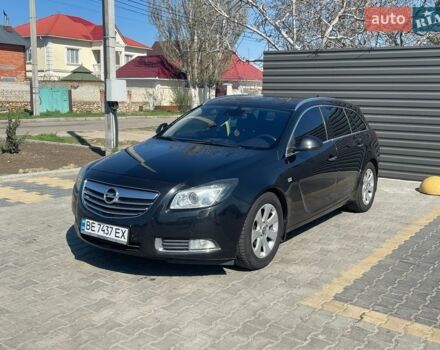 Чорний Опель Інсігнія, об'ємом двигуна 1.96 л та пробігом 250 тис. км за 8999 $, фото 1 на Automoto.ua