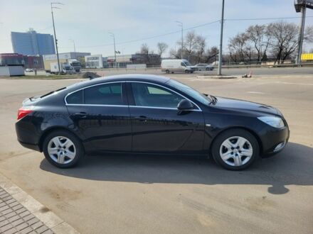 Черный Опель Инсигния, объемом двигателя 2 л и пробегом 265 тыс. км за 8800 $, фото 1 на Automoto.ua