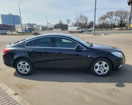 Черный Опель Инсигния, объемом двигателя 2 л и пробегом 265 тыс. км за 8800 $, фото 1 на Automoto.ua