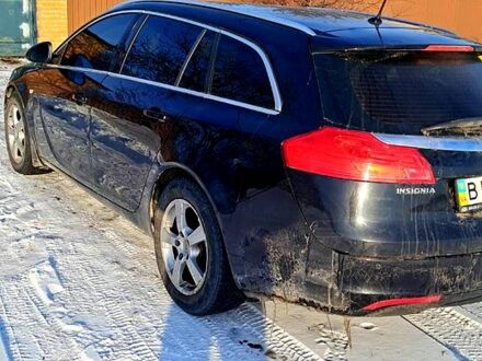 Черный Опель Инсигния, объемом двигателя 1.8 л и пробегом 24000 тыс. км за 6500 $, фото 1 на Automoto.ua