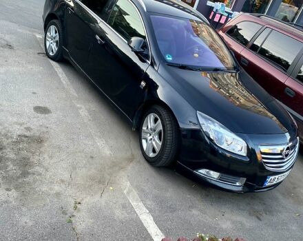 Черный Опель Инсигния, объемом двигателя 2 л и пробегом 200 тыс. км за 9500 $, фото 1 на Automoto.ua