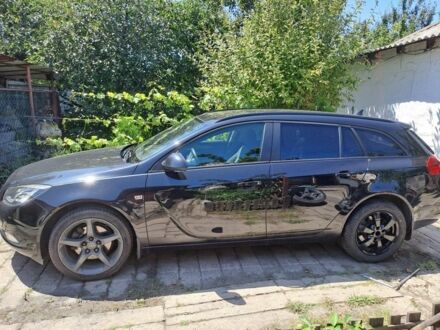 Чорний Опель Інсігнія, об'ємом двигуна 2 л та пробігом 350 тис. км за 7493 $, фото 1 на Automoto.ua