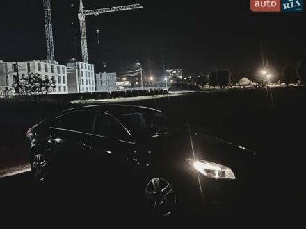 Чорний Опель Інсігнія, об'ємом двигуна 1.6 л та пробігом 203 тис. км за 7900 $, фото 1 на Automoto.ua