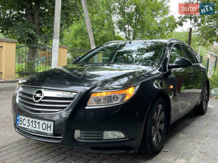 Черный Опель Инсигния, объемом двигателя 1.96 л и пробегом 230 тыс. км за 8500 $, фото 1 на Automoto.ua
