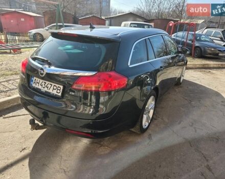 Чорний Опель Інсігнія, об'ємом двигуна 1.96 л та пробігом 273 тис. км за 7900 $, фото 1 на Automoto.ua
