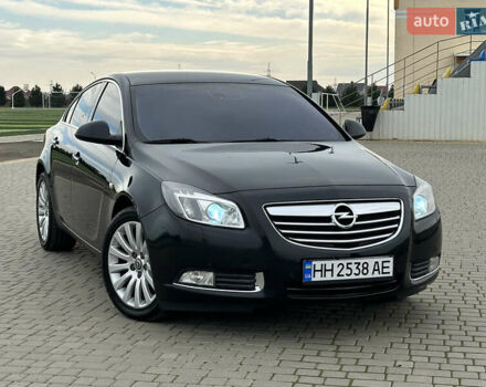 Черный Опель Инсигния, объемом двигателя 2 л и пробегом 310 тыс. км за 7700 $, фото 1 на Automoto.ua