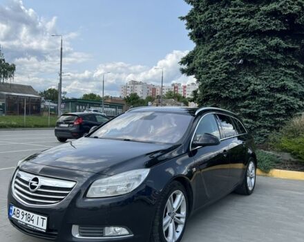 Черный Опель Инсигния, объемом двигателя 2 л и пробегом 345 тыс. км за 8500 $, фото 1 на Automoto.ua