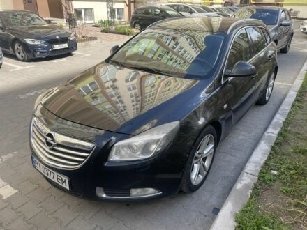 Черный Опель Инсигния, объемом двигателя 2 л и пробегом 209 тыс. км за 5500 $, фото 1 на Automoto.ua