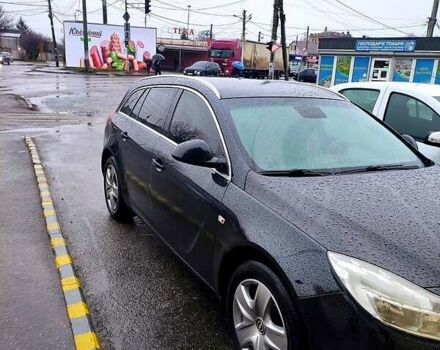 Чорний Опель Інсігнія, об'ємом двигуна 2 л та пробігом 250 тис. км за 7999 $, фото 1 на Automoto.ua