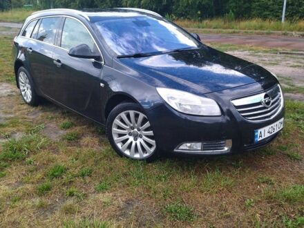 Чорний Опель Інсігнія, об'ємом двигуна 2 л та пробігом 313 тис. км за 7900 $, фото 1 на Automoto.ua