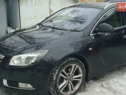 Чорний Опель Інсігнія, об'ємом двигуна 1.96 л та пробігом 247 тис. км за 9499 $, фото 1 на Automoto.ua