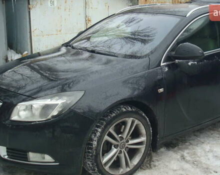 Чорний Опель Інсігнія, об'ємом двигуна 1.96 л та пробігом 247 тис. км за 9499 $, фото 1 на Automoto.ua