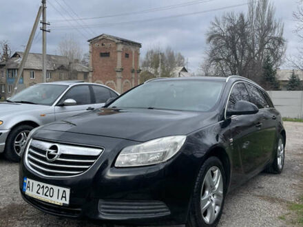 Черный Опель Инсигния, объемом двигателя 2 л и пробегом 220 тыс. км за 7500 $, фото 1 на Automoto.ua