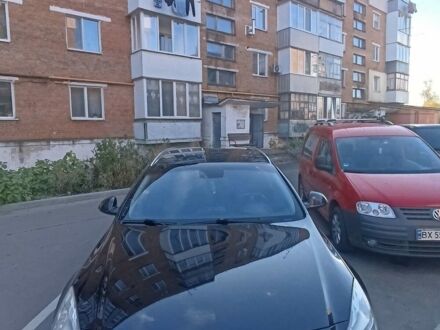 Чорний Опель Інсігнія, об'ємом двигуна 2 л та пробігом 240 тис. км за 6900 $, фото 1 на Automoto.ua