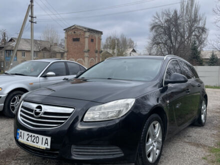 Черный Опель Инсигния, объемом двигателя 2 л и пробегом 220 тыс. км за 7500 $, фото 1 на Automoto.ua