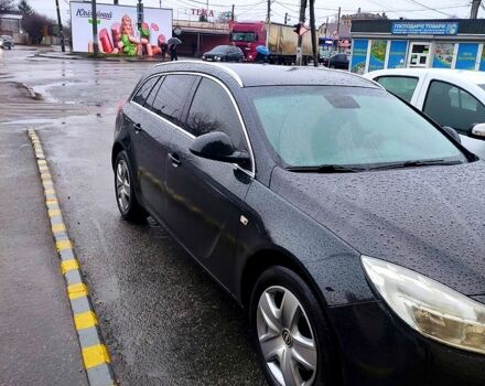 Черный Опель Инсигния, объемом двигателя 2 л и пробегом 30000 тыс. км за 7499 $, фото 1 на Automoto.ua