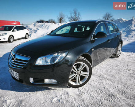 Чорний Опель Інсігнія, об'ємом двигуна 1.96 л та пробігом 210 тис. км за 8999 $, фото 1 на Automoto.ua
