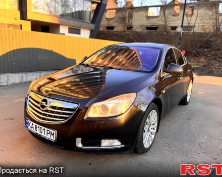 Черный Опель Инсигния, объемом двигателя 2 л и пробегом 217 тыс. км за 8500 $, фото 1 на Automoto.ua