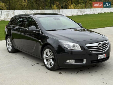 Черный Опель Инсигния, объемом двигателя 2 л и пробегом 169 тыс. км за 10999 $, фото 1 на Automoto.ua
