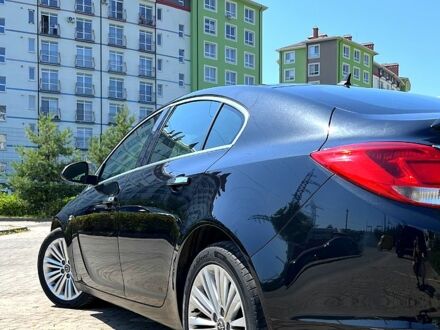 Черный Опель Инсигния, объемом двигателя 2 л и пробегом 312 тыс. км за 7800 $, фото 1 на Automoto.ua