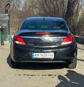 Чорний Опель Інсігнія, об'ємом двигуна 2 л та пробігом 227 тис. км за 8000 $, фото 1 на Automoto.ua