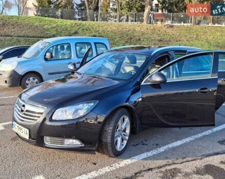 Чорний Опель Інсігнія, об'ємом двигуна 1.96 л та пробігом 180 тис. км за 9900 $, фото 1 на Automoto.ua