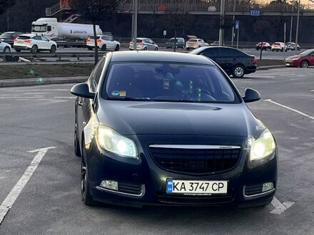 Черный Опель Инсигния, объемом двигателя 2 л и пробегом 300 тыс. км за 8600 $, фото 1 на Automoto.ua