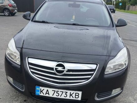 Чорний Опель Інсігнія, об'ємом двигуна 1.96 л та пробігом 310 тис. км за 6800 $, фото 1 на Automoto.ua