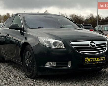 Чорний Опель Інсігнія, об'ємом двигуна 1.36 л та пробігом 161 тис. км за 8750 $, фото 1 на Automoto.ua
