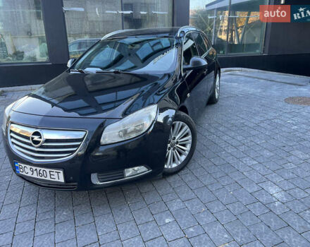 Чорний Опель Інсігнія, об'ємом двигуна 2 л та пробігом 261 тис. км за 8500 $, фото 1 на Automoto.ua